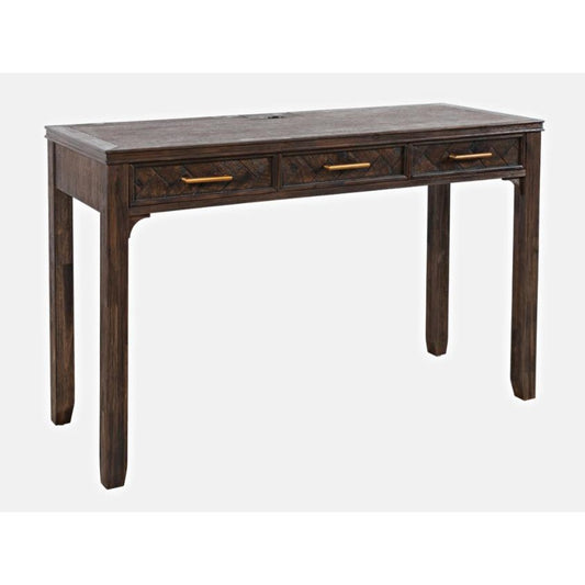 Dark wooden table with three drawers and brass handles.
