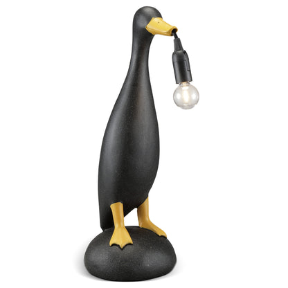 Duck-shaped lamp holding a bulb in its beak.
