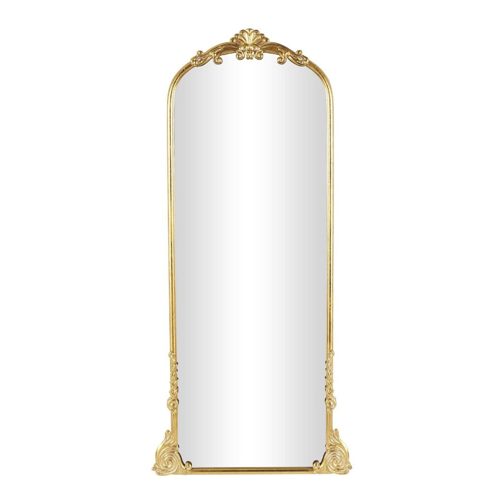 Elegant gold-framed floor mirror with ornate details.