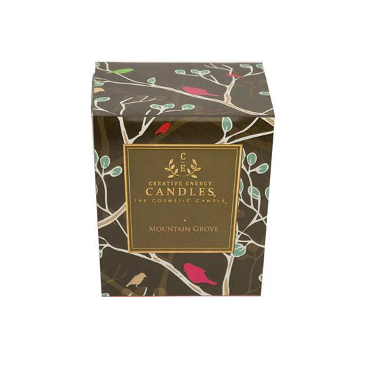 Decorative candle box with nature design and "Mountain Grove" label.