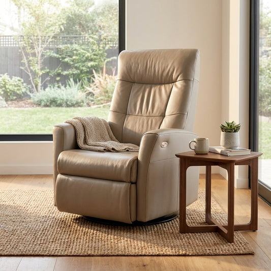 Beige leather recliner chair with a high back and cushioned arms.