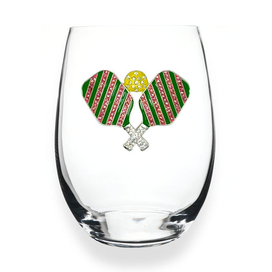 Glass with festive pickleball design featuring paddles and a ball.