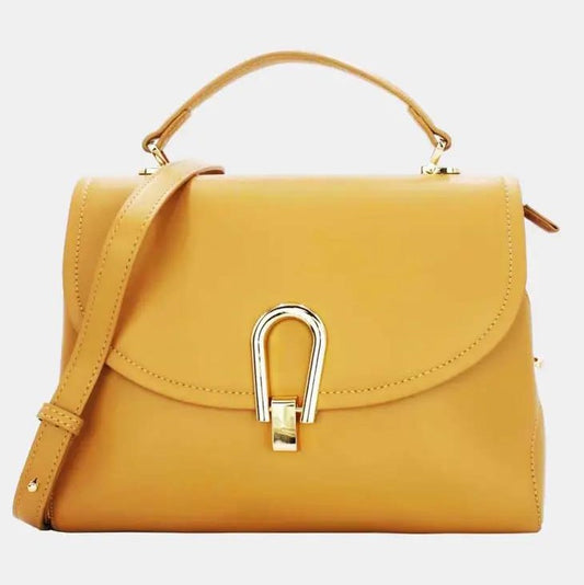 Yellow handbag with gold clasp and top handle.