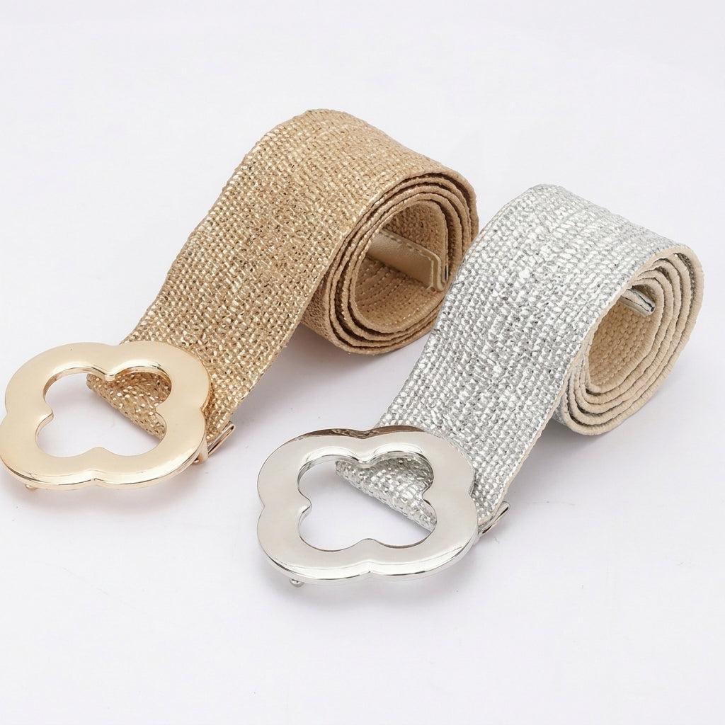 Two woven belts with flower-shaped metal buckles, in beige and silver.