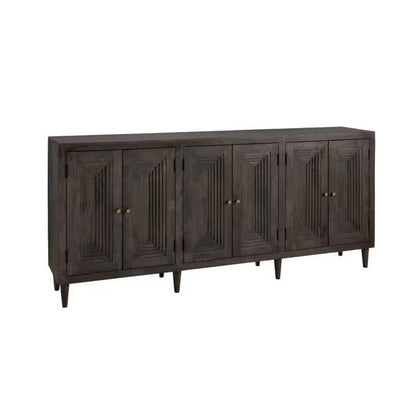 Dark wood sideboard with textured doors and brass knobs.