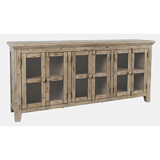 Rustic wooden sideboard with glass-paneled doors and shelves.