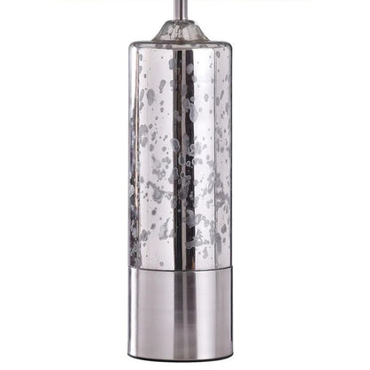 Metallic silver cylindrical lamp with speckled design.