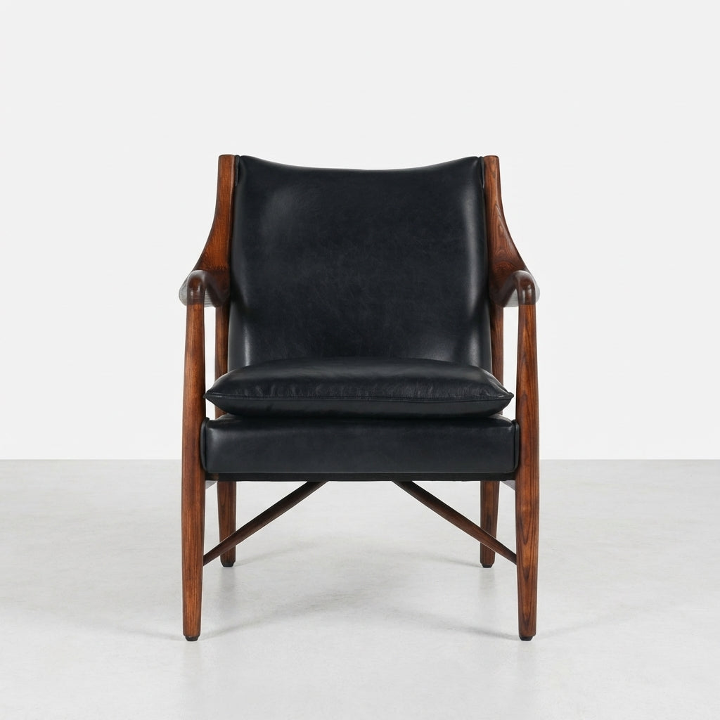 Wooden chair with black leather upholstery and armrests.