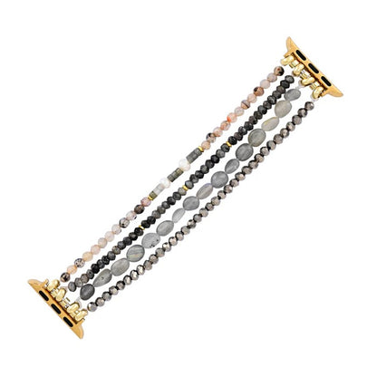 Multicolor beaded watch band with gold connectors.