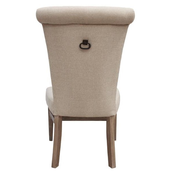 Beige upholstered chair with wooden legs viewed from the back.