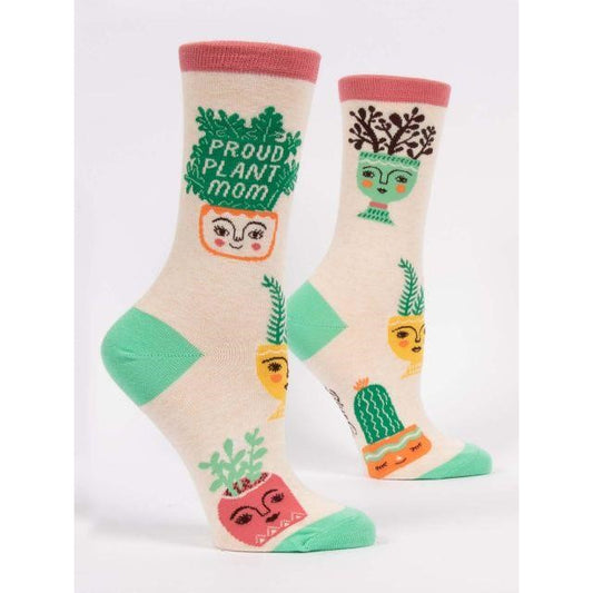 Colorful socks with quirky plant pot faces and "Proud Plant Mom" text.