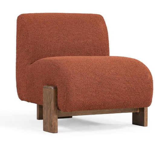Rust-colored, tufted chair with wooden base, minimalist design.