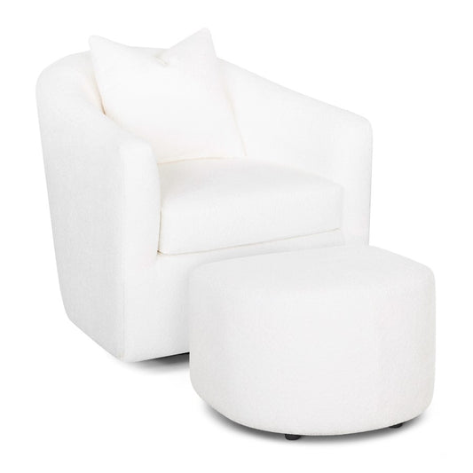 White armchair with ottoman and cushion.