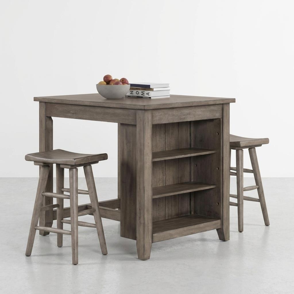 Wooden table with stools, a bowl of apples, and books on top.