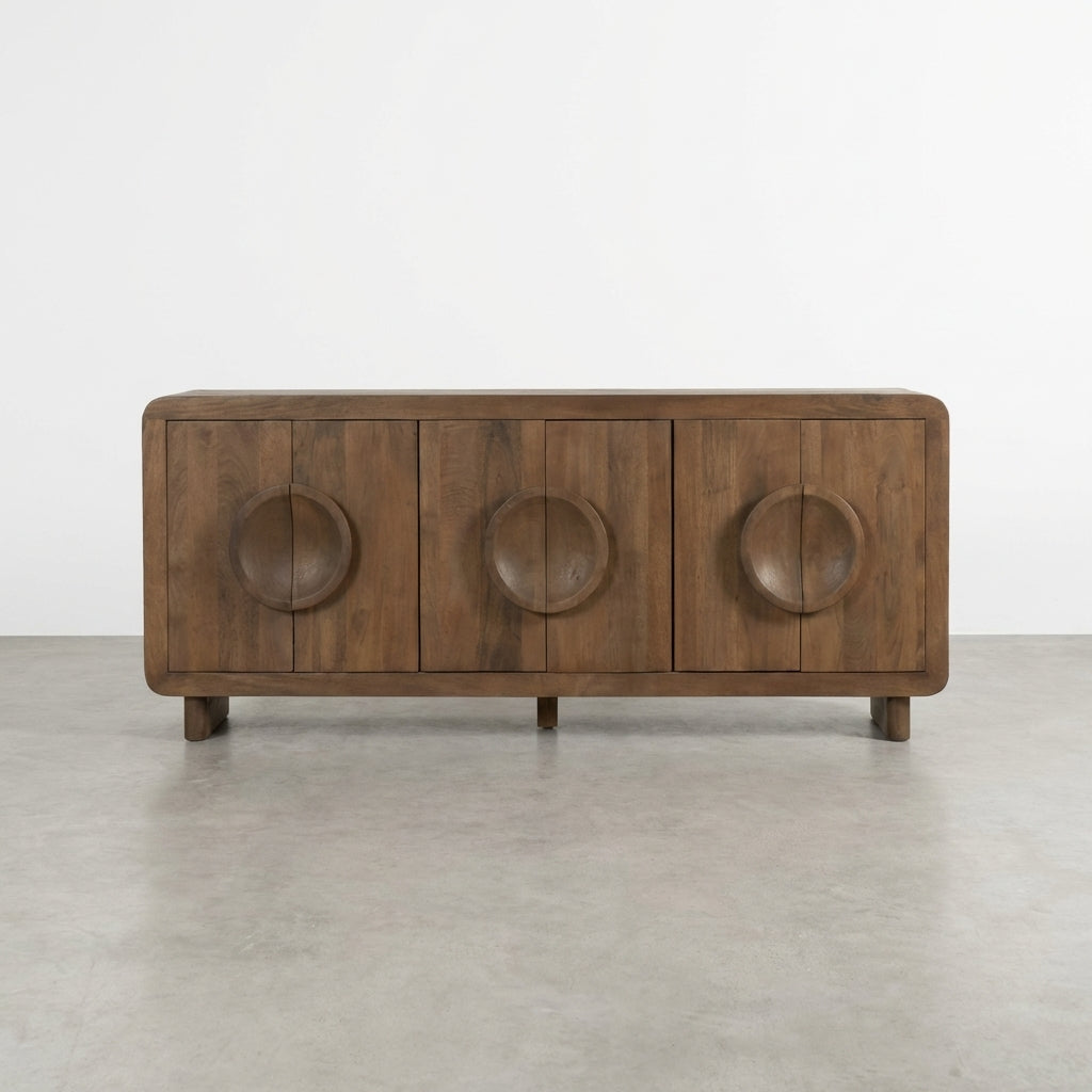 Wooden sideboard with circular handles, center doors open, revealing shelves inside.
