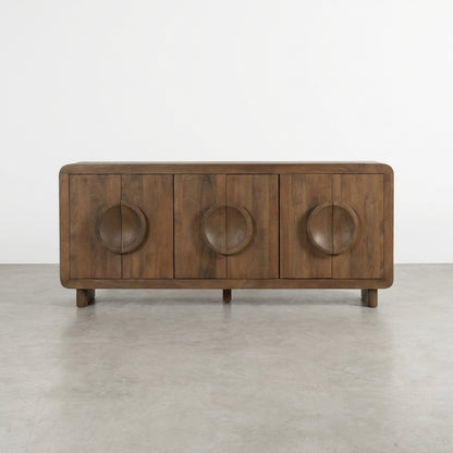 Wooden sideboard with circular handles, center doors open, revealing shelves inside.