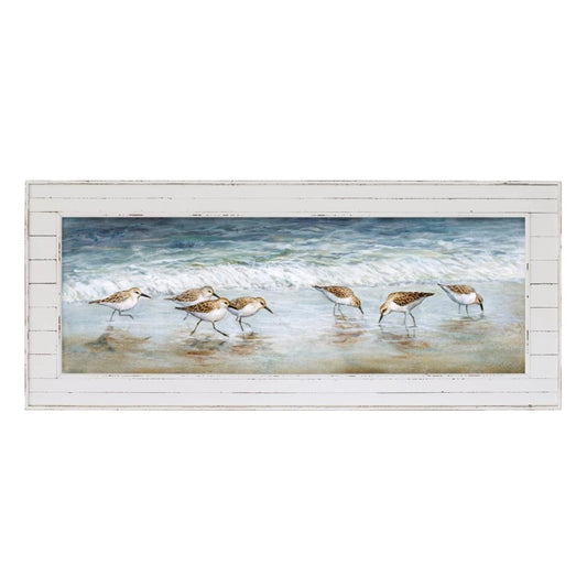 Painting of shorebirds at the beach in a rustic white frame.