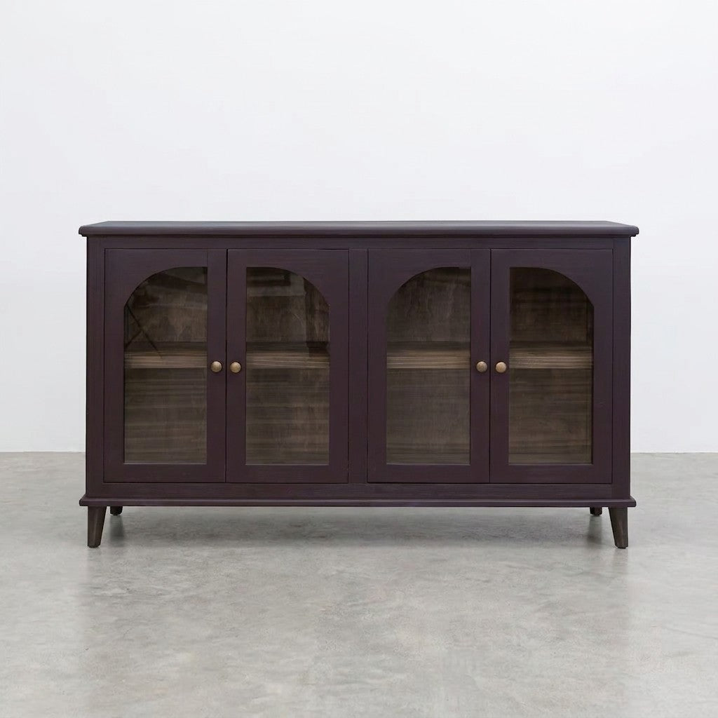 Dark wood cabinet with glass doors, arched design, and round knobs.