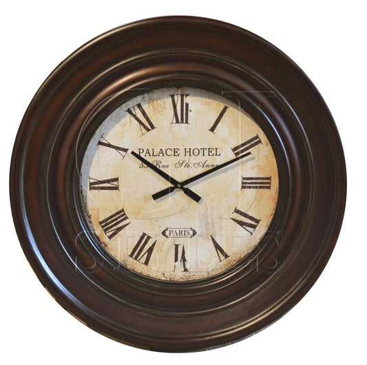 Vintage wall clock with Roman numerals and "Palace Hotel" label.