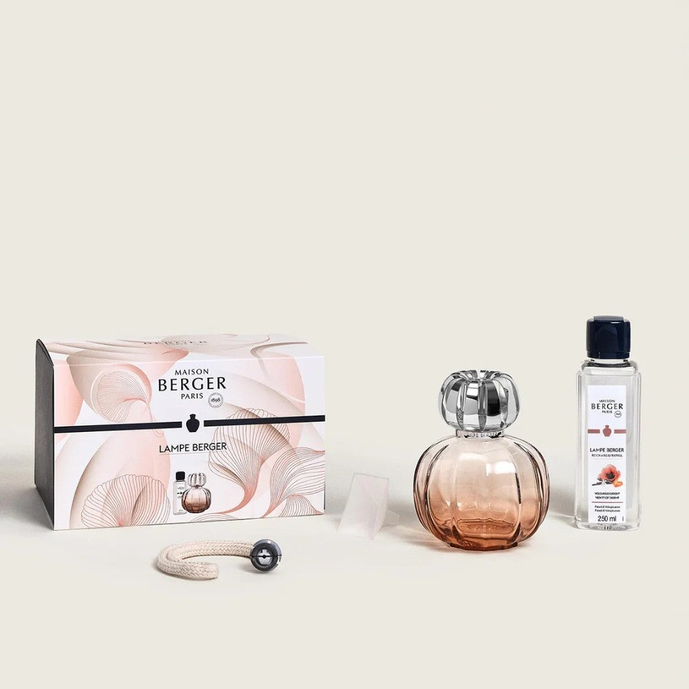 Lampe Berger set with perfume, bottle, and stylish packaging.