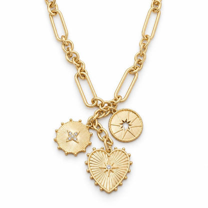 Gold chain with three star-themed charms.