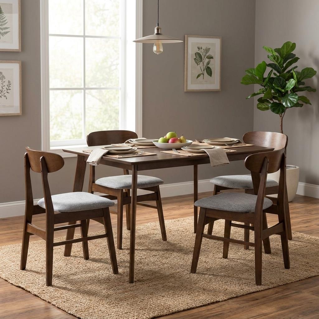 Cozy dining room with wooden table, chairs, and a potted plant.