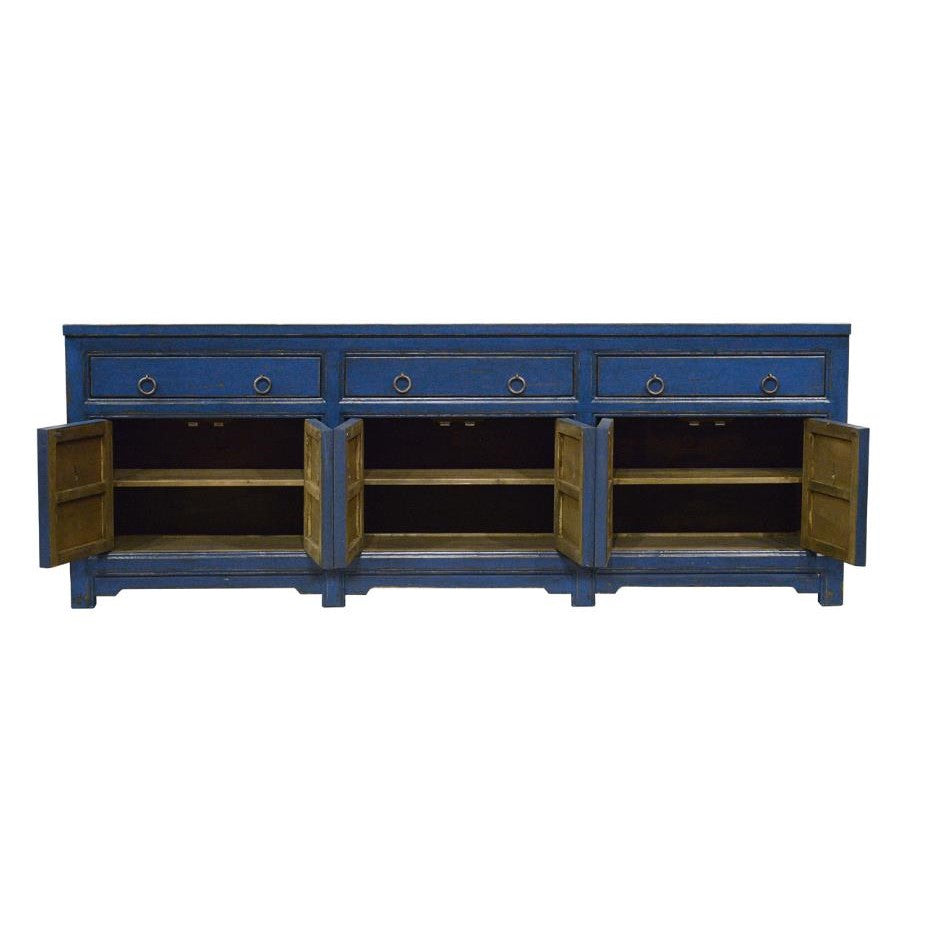 Blue sideboard with four open cabinets and drawers.