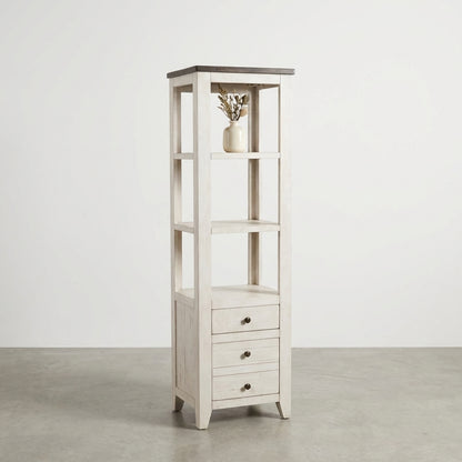 White shelf with drawers and dark top.