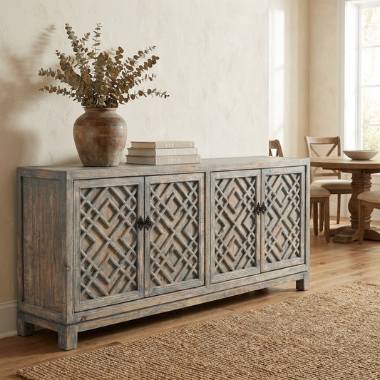 Rustic wooden sideboard with geometric patterns on cabinet doors.