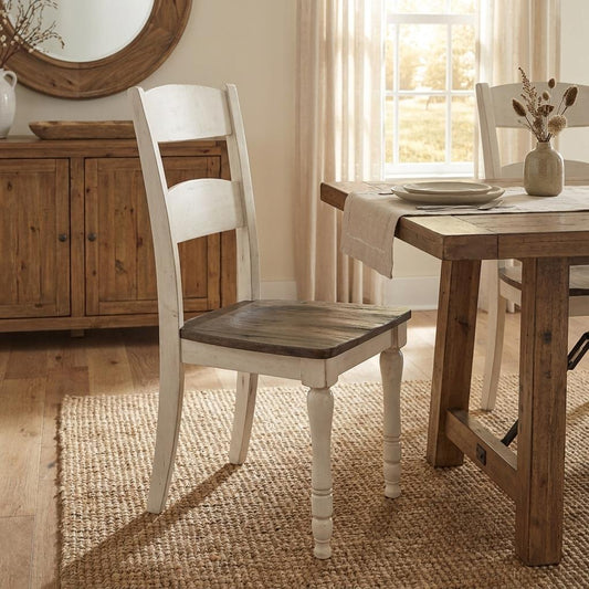 Wooden chair with white frame and dark seat.