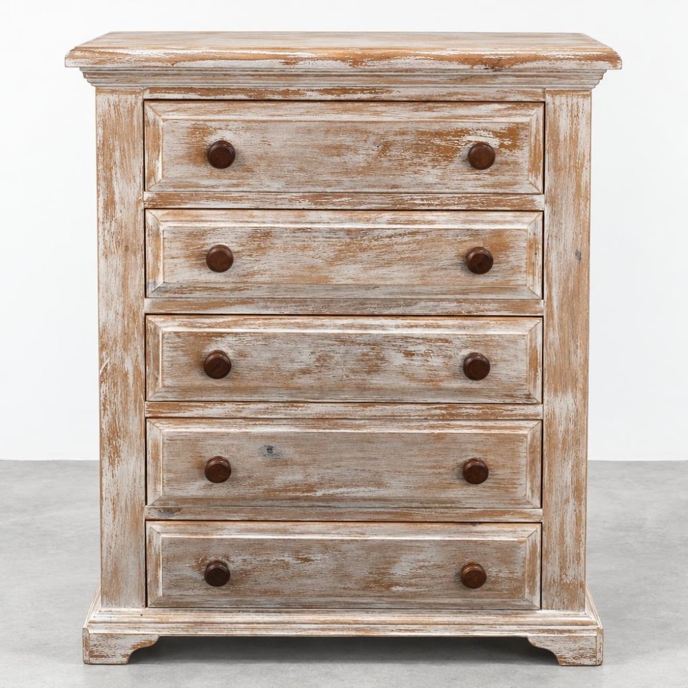 Rustic wooden chest with five drawers and round knobs.