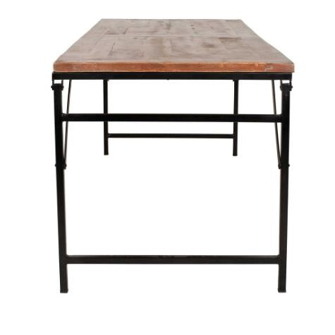 Wooden table with black metal legs, viewed from the front.