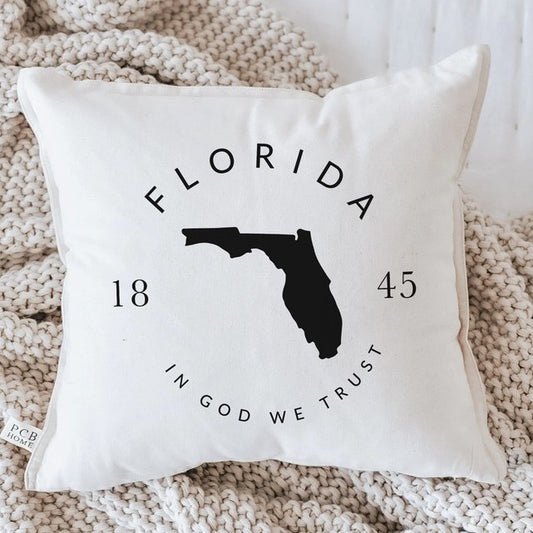 Cushion with Florida map, 1845, and "In God We Trust" text.