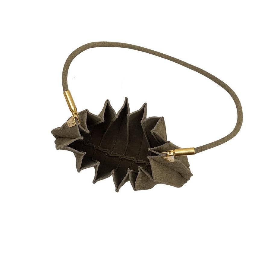 Olive green pleated bag with a gold accented handle.