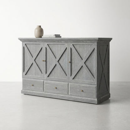 Gray cabinet with crisscross doors, topped with books and a vase.