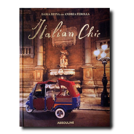 Book cover: "Italian Chic" with a vintage vehicle by a decorative fountain.