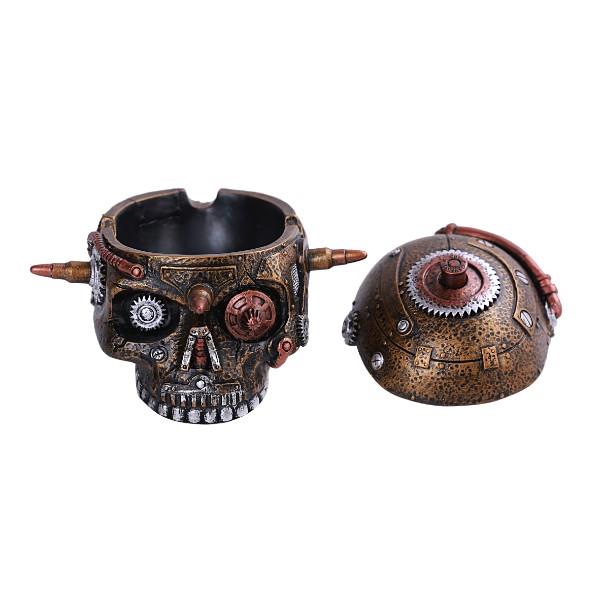 Steampunk skull container with removable lid, decorated with gears and pipes.