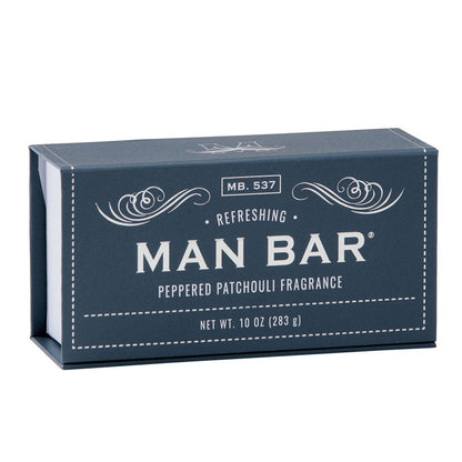 Blue box of Man Bar soap with patchouli fragrance.