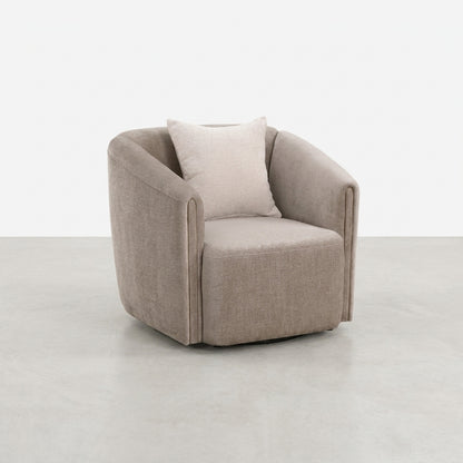 Beige upholstered armchair with cushion, side view.