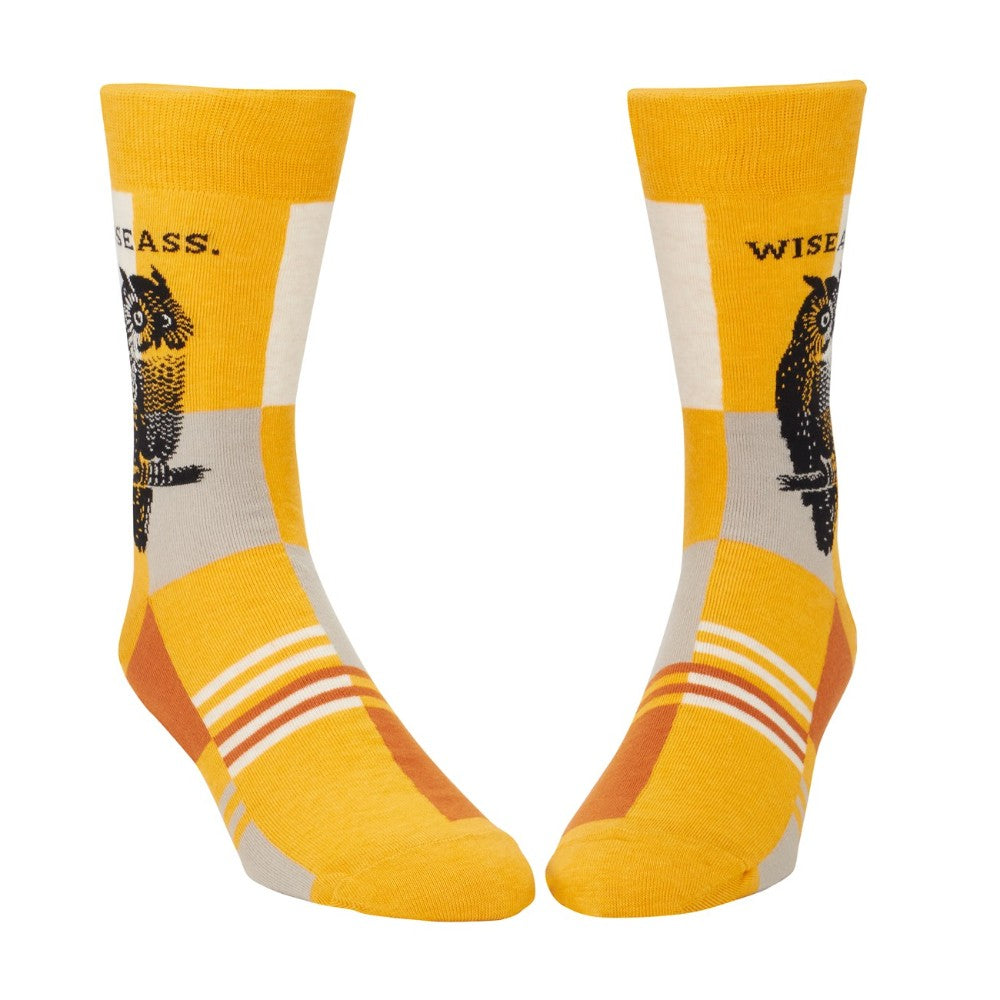 Yellow socks with owl design and the word "WISEASS" printed on them.
