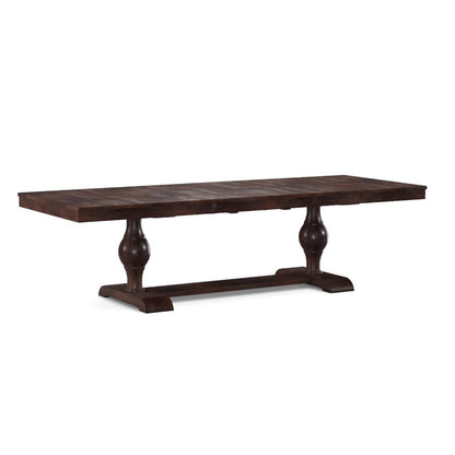 Dark wooden dining table with elegant double pedestal base.