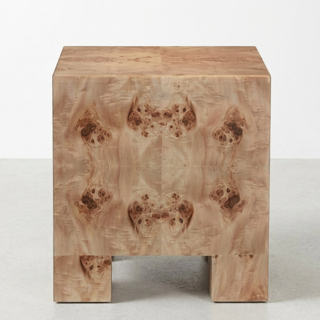 Wooden side table with intricate burl pattern design.