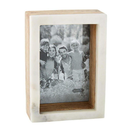 Wooden frame with a black-and-white family photo.