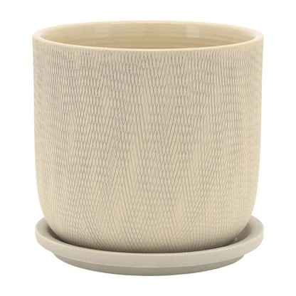 Textured beige ceramic planter with a matching saucer.