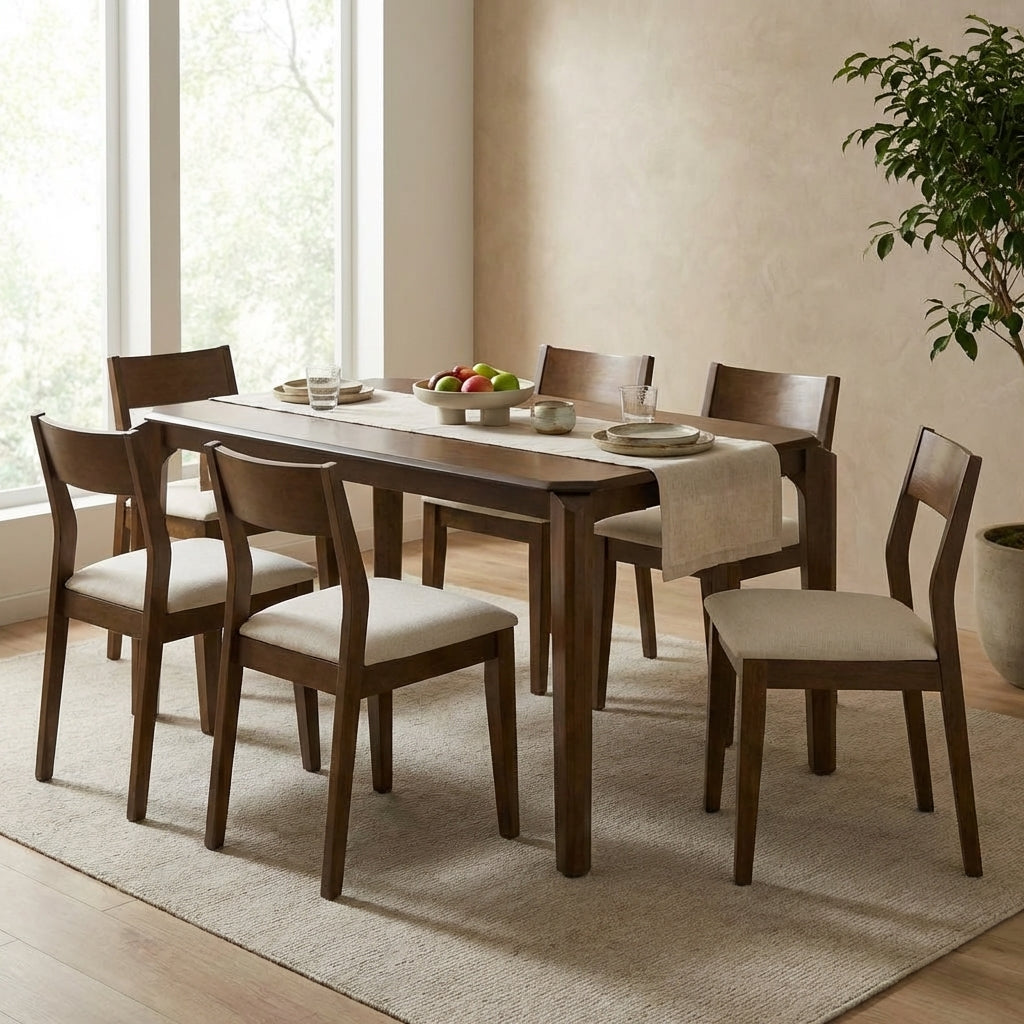 Wood dining set with six chairs, apples on table, natural light.