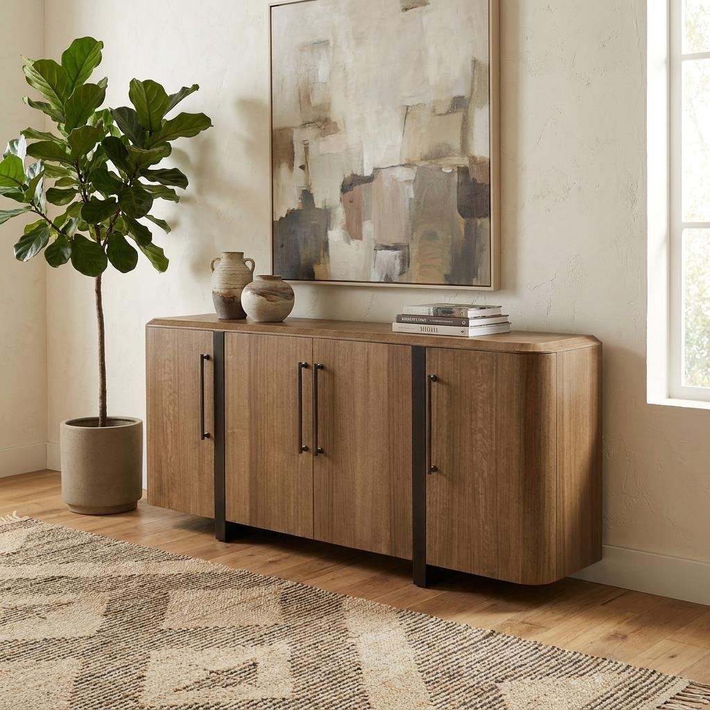 Modern room with sideboard, plants, and abstract art.