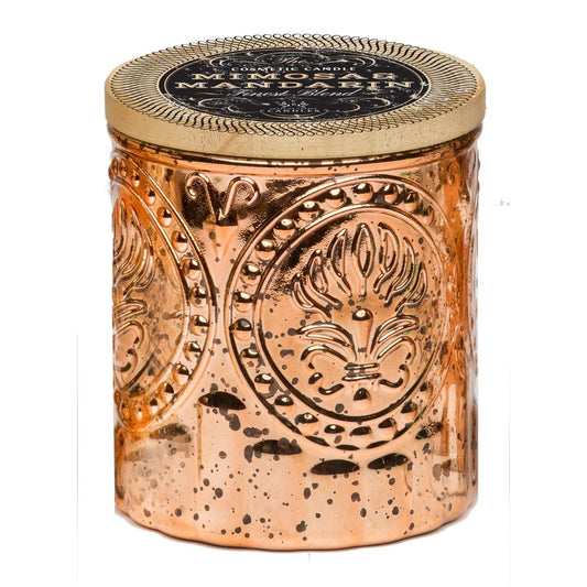 Ornate bronze candle jar with intricate embossed patterns and golden lid.