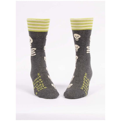 Gray socks with skulls, yellow stripes, and funny text on front.