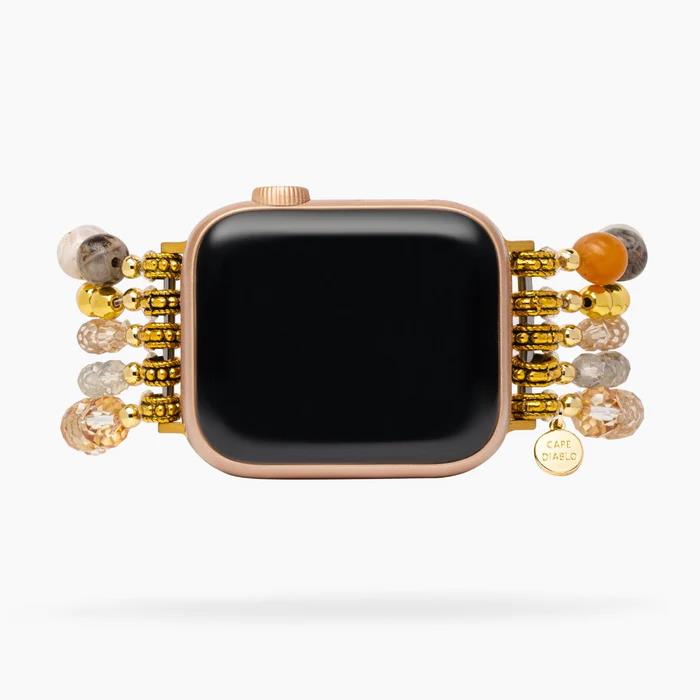 Smartwatch with beaded bracelet band in gold and earth tones.