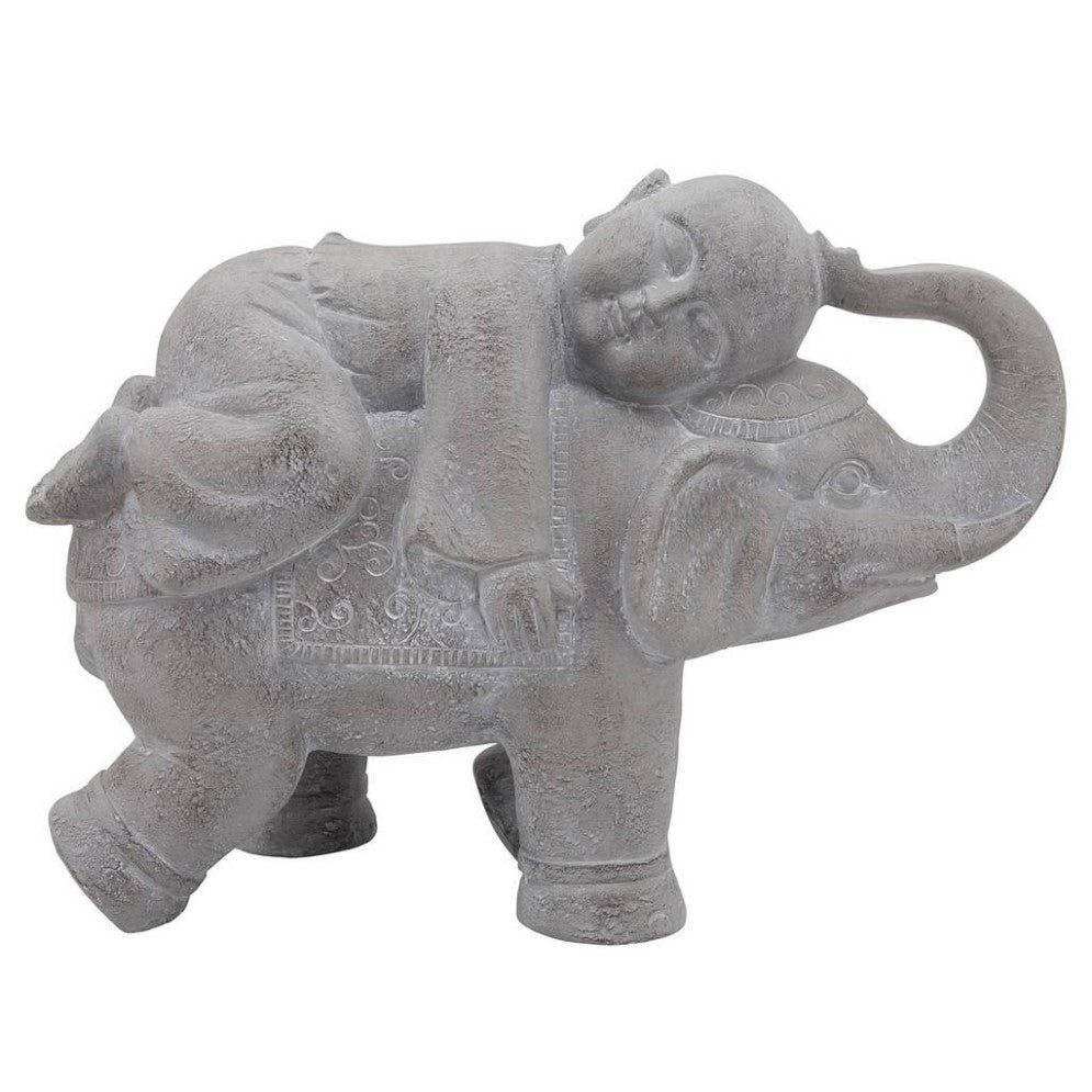 Picture of Child Riding on Elephant Statue